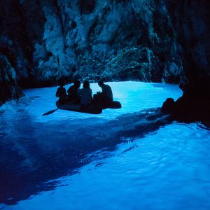 Exploring Blue cave with dinghy