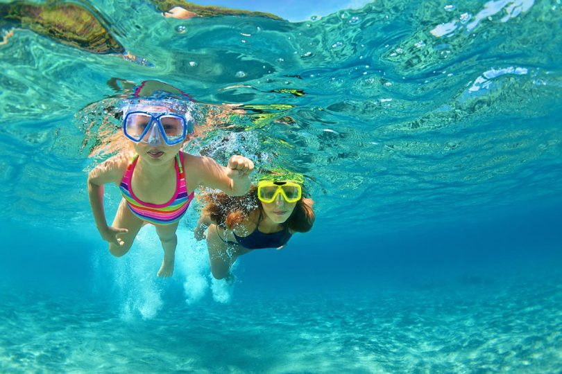 Snorkeling in the shallow sea of the Blue lagoon