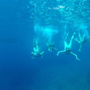 Underwater group photo in Stiniva Cove
