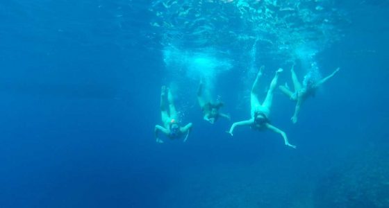 Underwater group photo in Stiniva Cove