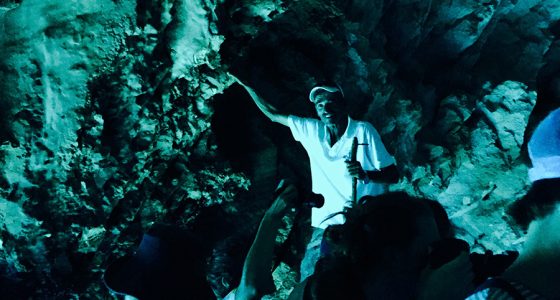 Taking photos inside the Blue Cave