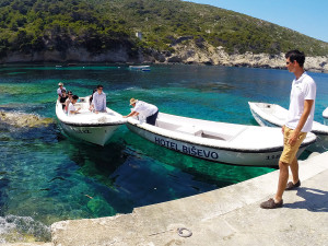 wooden boat to enter inside the Blue Cave