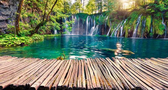 Trail over the calm lake of Plitvice