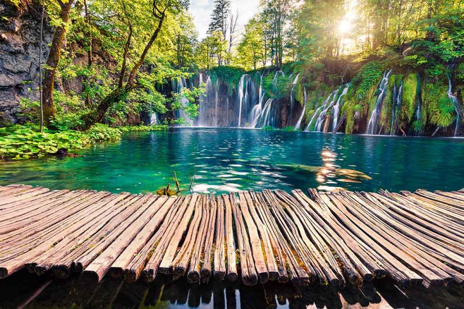 Trail over the calm lake of Plitvice