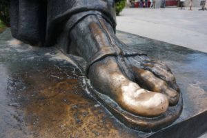 Golden toe of Gregury Nin statue