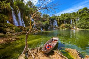 boat on the lake by Kravice falls